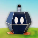 Crea tu propio Bob-omb en papel con esta plantilla descargable. Manualidad divertida, educativa y ecológica para niños y fans de Mario.